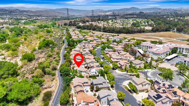 27735 Summer Grove Pl, Valencia, CA 91354 - aerial view of property's location with mountains and nearby suburban area