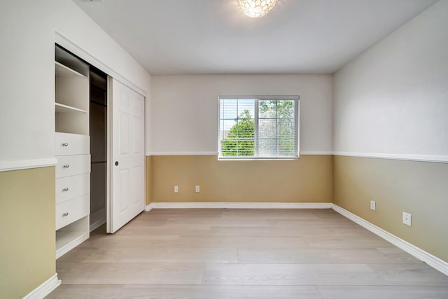 27735 Summer Grove Pl, Valencia, CA 91354 - unfurnished bedroom featuring light wood-type flooring, baseboards, and a closet