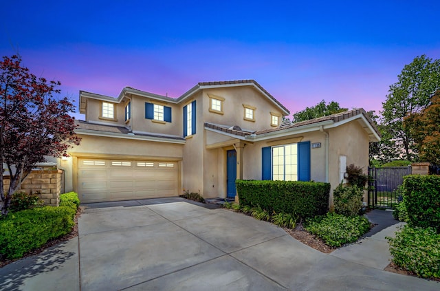 27735 Summer Grove Pl, Valencia, CA 91354 - view of front of house with stucco siding, driveway, an attached garage, and a tiled roof