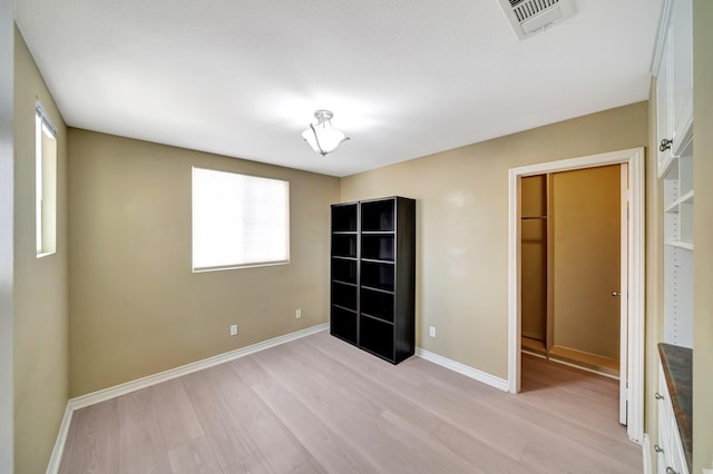 27735 Summer Grove Pl, Valencia, CA 91354 - unfurnished bedroom with light wood finished floors and baseboards