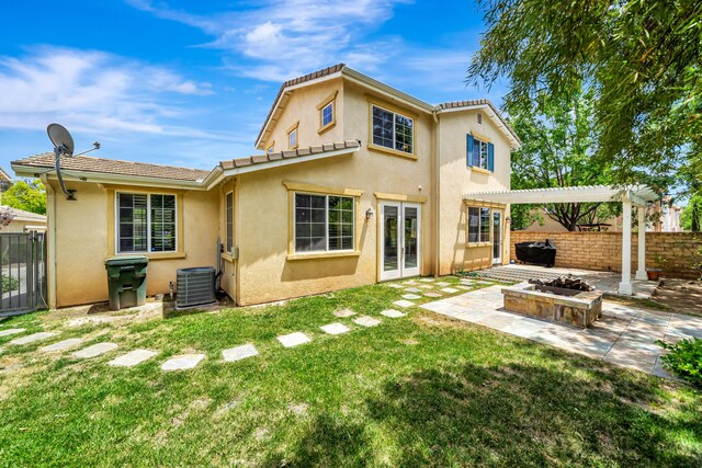 27735 Summer Grove Pl, Valencia, CA 91354 - back of house with stucco siding, a pergola, cooling unit, and a patio