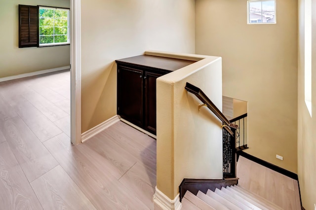 27735 Summer Grove Pl, Valencia, CA 91354 - staircase with plenty of natural light, baseboards, and wood finished floors