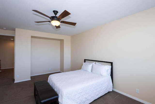 carpeted bedroom with ceiling fan