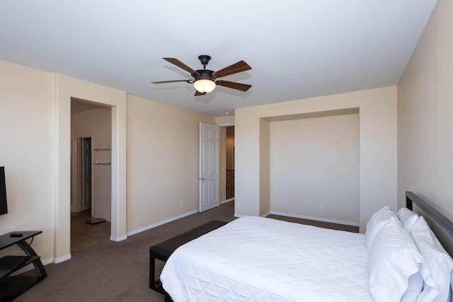 bedroom with ceiling fan and carpet