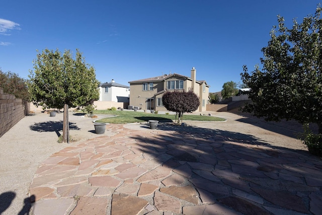 view of front of house featuring a patio