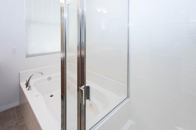 bathroom with shower with separate bathtub