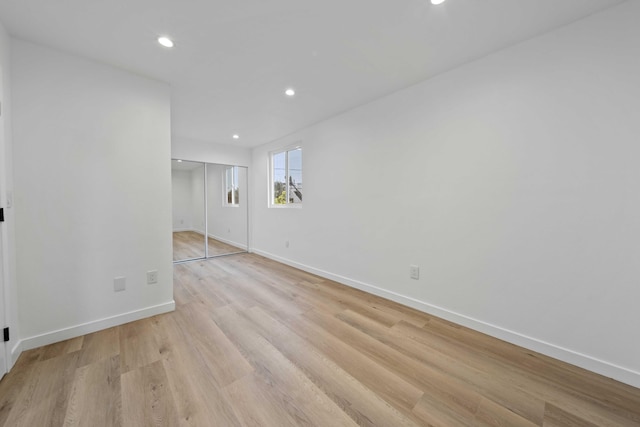 11946 Aneta St, Culver City, CA 90230 - unfurnished room with light wood-style flooring, baseboards, and recessed lighting