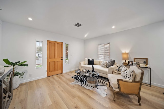 11946 Aneta St, Culver City, CA 90230 - living area featuring light wood finished floors, visible vents, and plenty of natural light