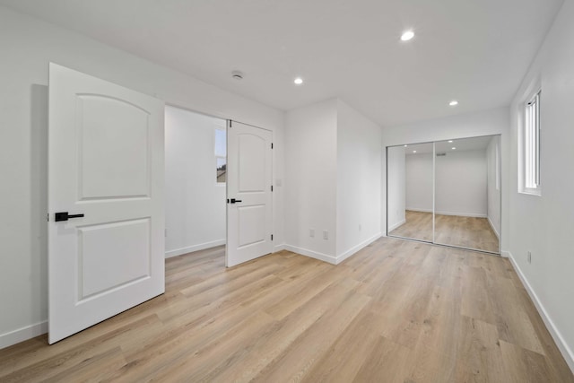 11946 Aneta St, Culver City, CA 90230 - unfurnished bedroom with light wood-style flooring, baseboards, and recessed lighting
