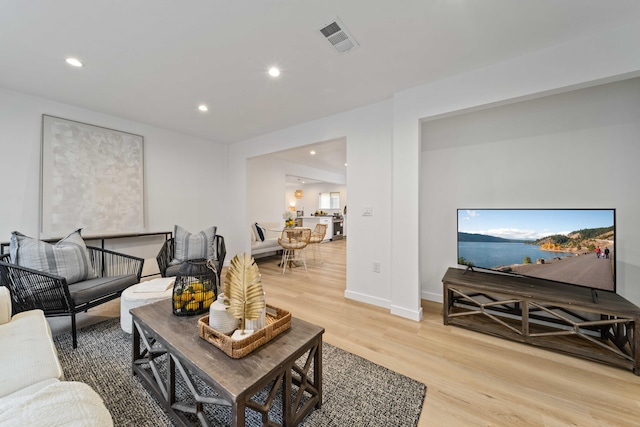 11946 Aneta St, Culver City, CA 90230 - living area with visible vents, light wood-style flooring, recessed lighting, and baseboards