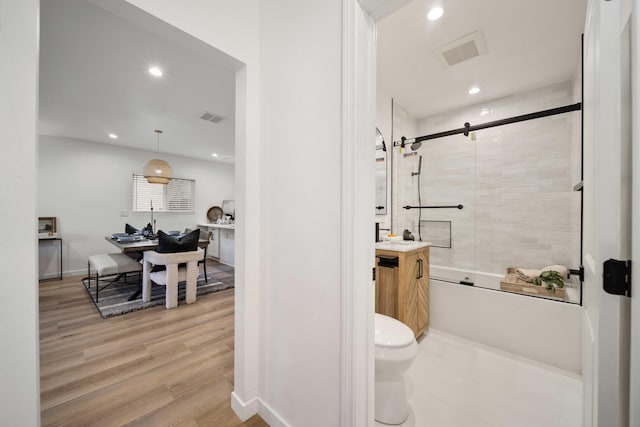 11946 Aneta St, Culver City, CA 90230 - full bath with wood finished floors, vanity, visible vents, and recessed lighting