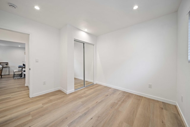 11946 Aneta St, Culver City, CA 90230 - unfurnished bedroom featuring a closet, baseboards, light wood-type flooring, and recessed lighting