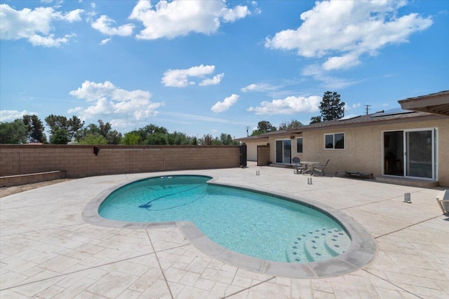 44850 E 43rd St, Lancaster, CA 93535 - view of swimming pool featuring a patio and a fenced backyard