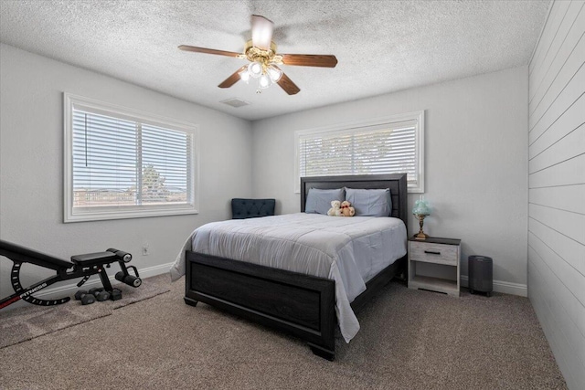 44850 E 43rd St, Lancaster, CA 93535 - carpeted bedroom with a textured ceiling, ceiling fan, and baseboards