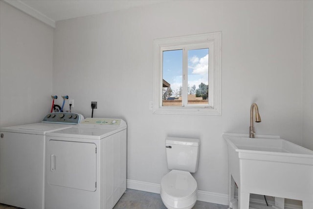 44850 E 43rd St, Lancaster, CA 93535 - laundry room with separate washer and dryer and baseboards