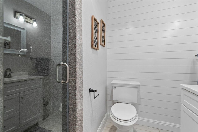 44850 E 43rd St, Lancaster, CA 93535 - full bath featuring a stall shower, toilet, vanity, and baseboards