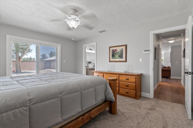 44850 E 43rd St, Lancaster, CA 93535 - bedroom with access to outside, a textured ceiling, light colored carpet, ceiling fan, and ensuite bath