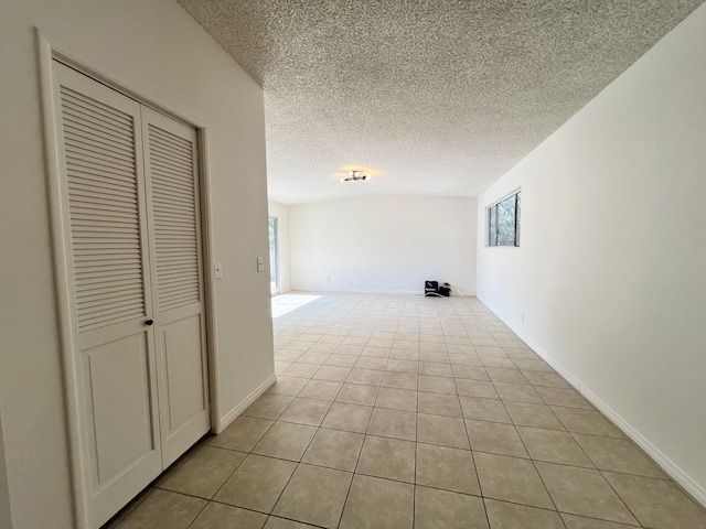 interior space featuring a textured ceiling