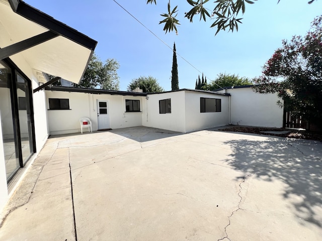 exterior space with a patio