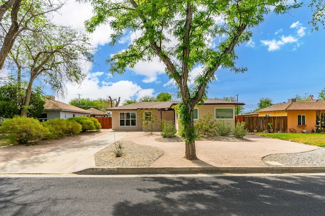 44251 Date Ave, Lancaster, CA 93534 - ranch-style house with fence, driveway, and stucco siding
