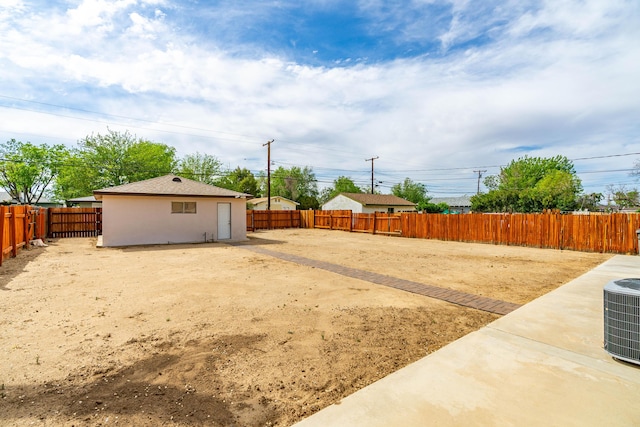 44251 Date Ave, Lancaster, CA 93534 - view of yard featuring central AC and a fenced backyard