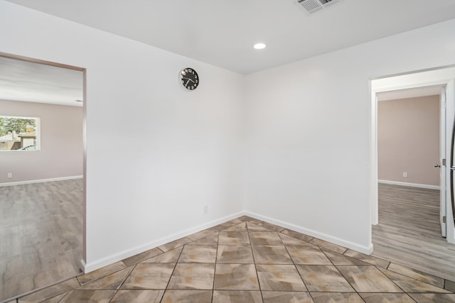 44251 Date Ave, Lancaster, CA 93534 - unfurnished room with recessed lighting, wood finished floors, visible vents, and baseboards
