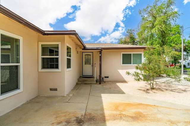 44251 Date Ave, Lancaster, CA 93534 - property entrance with a patio area, crawl space, and stucco siding
