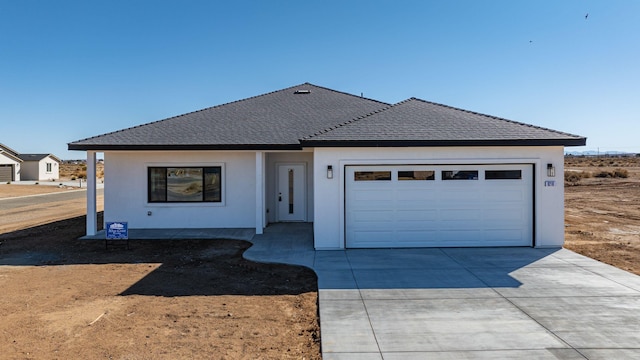 view of front of house with a garage