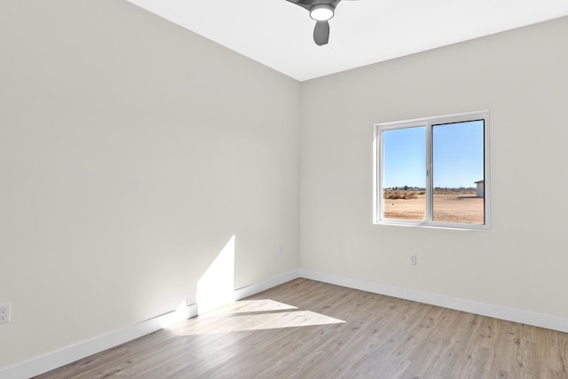 unfurnished room featuring ceiling fan and light hardwood / wood-style floors