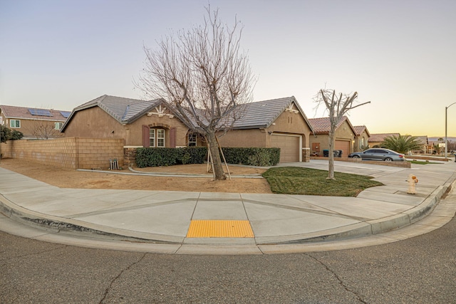 single story home featuring a garage