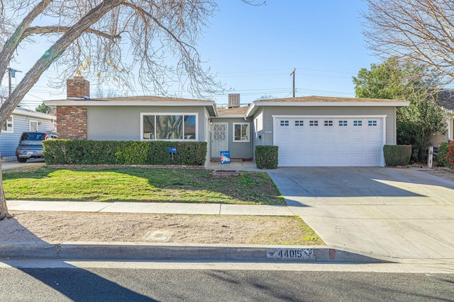 ranch-style house with a garage and a front lawn