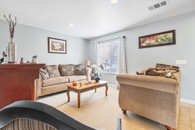 living area with recessed lighting, baseboards, and visible vents