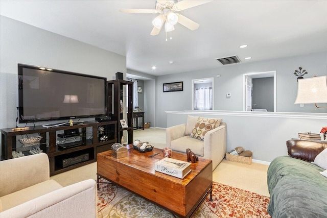 carpeted living room featuring visible vents, recessed lighting, baseboards, and a ceiling fan