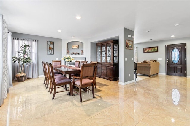 dining room featuring recessed lighting, baseboards, and marble finish floor