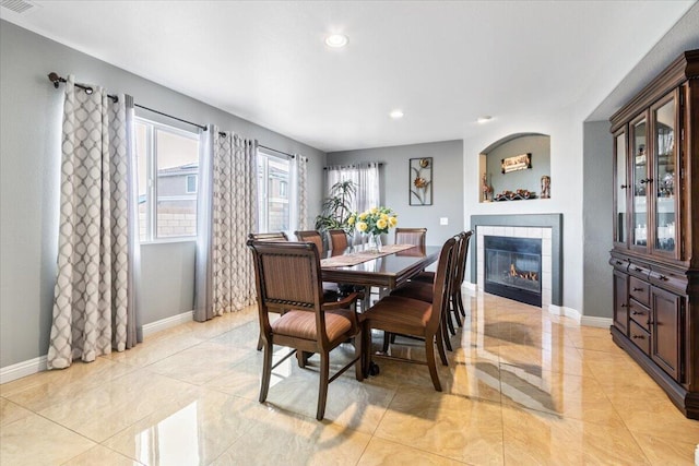 dining area with visible vents, recessed lighting, a fireplace, and baseboards