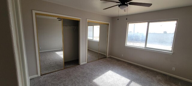 laundry area with electric dryer hookup, hookup for a washing machine, and cabinets