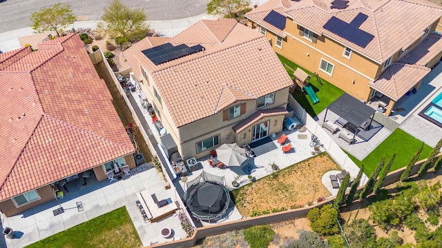 birds eye view of property with a residential view
