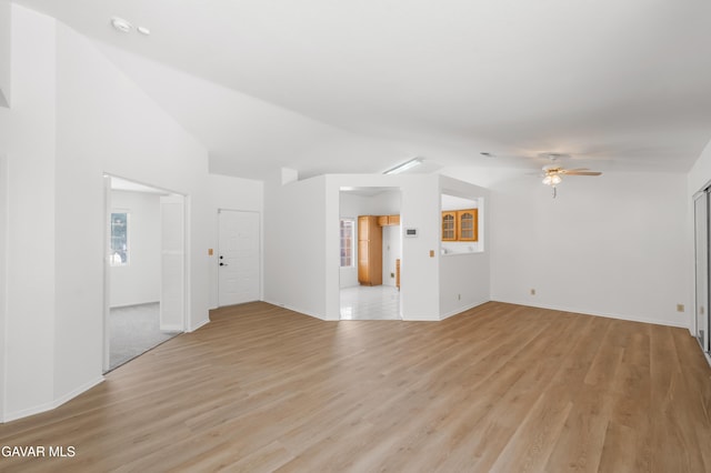 44242 Brandon Thomas Way, Lancaster, CA 93536 - unfurnished living room with lofted ceiling, ceiling fan, and light wood-style floors