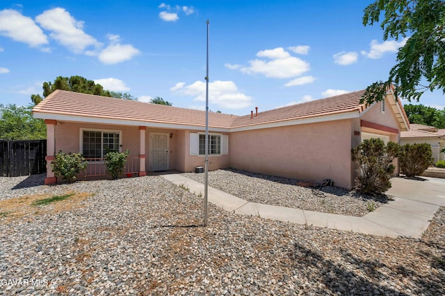 44242 Brandon Thomas Way, Lancaster, CA 93536 - view of front of property featuring a garage, stucco siding, a tiled roof, and driveway