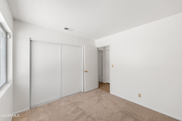 44242 Brandon Thomas Way, Lancaster, CA 93536 - unfurnished bedroom with carpet flooring and a closet