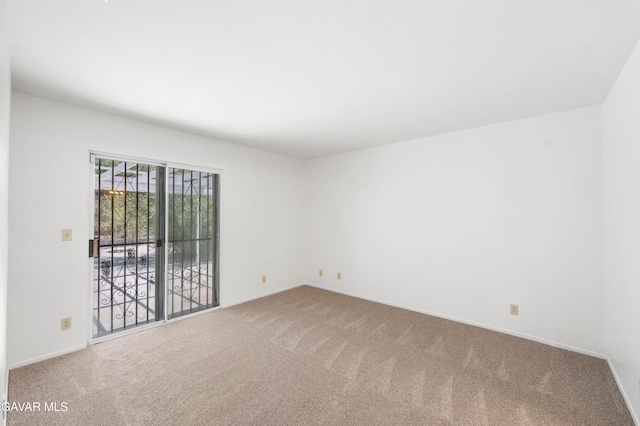 44242 Brandon Thomas Way, Lancaster, CA 93536 - carpeted empty room with baseboards