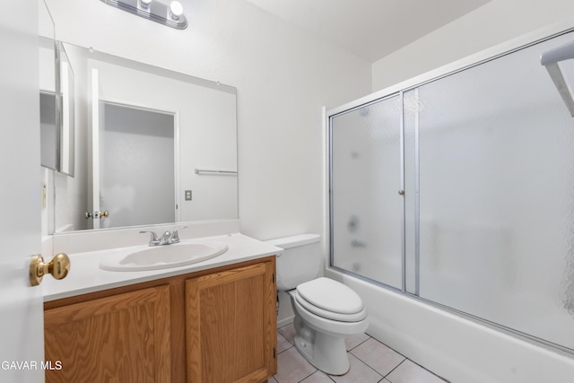 44242 Brandon Thomas Way, Lancaster, CA 93536 - bathroom featuring vanity, tile patterned floors, and combined bath / shower with glass door