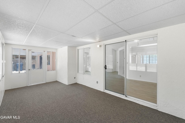 44242 Brandon Thomas Way, Lancaster, CA 93536 - spare room featuring a drop ceiling and carpet