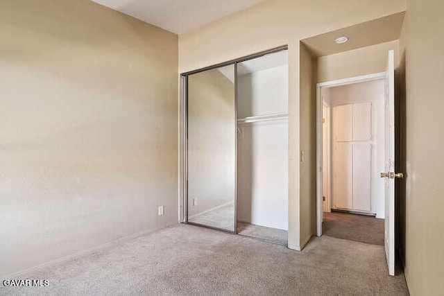 43667 Park Ave, Lancaster, CA 93534 - unfurnished bedroom with carpet flooring and a closet