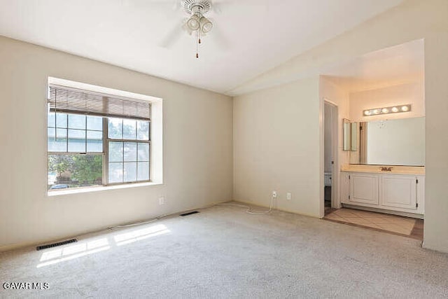 43667 Park Ave, Lancaster, CA 93534 - unfurnished bedroom with light colored carpet and ensuite bathroom