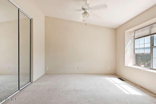 43667 Park Ave, Lancaster, CA 93534 - unfurnished bedroom featuring carpet flooring, a ceiling fan, and a closet