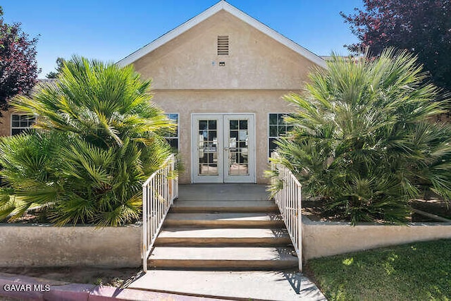 43667 Park Ave, Lancaster, CA 93534 - entrance to property with french doors and stucco siding