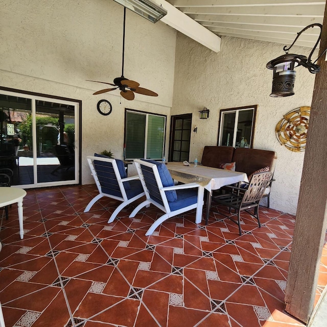 view of patio / terrace featuring ceiling fan