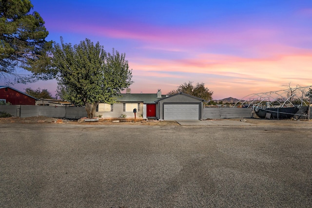 view of front of property with a garage