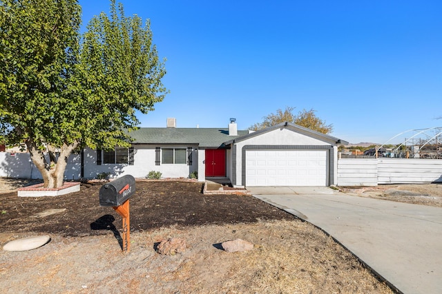 single story home with a garage